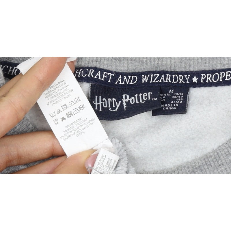 Additional view of Harry Potter women’s grey m hogwarts alumni fleece pullover sweatshirt