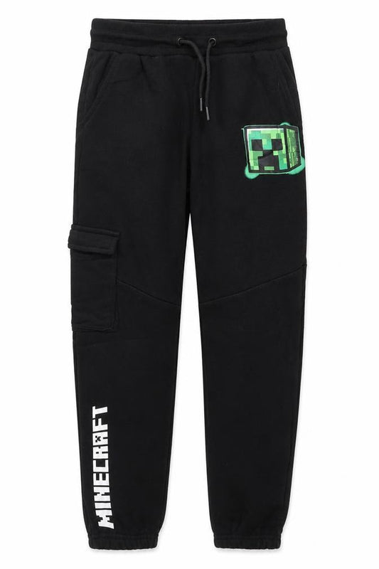 Front view of Mojang Studios boys’ black minecraft jogger trousers 12-13 years