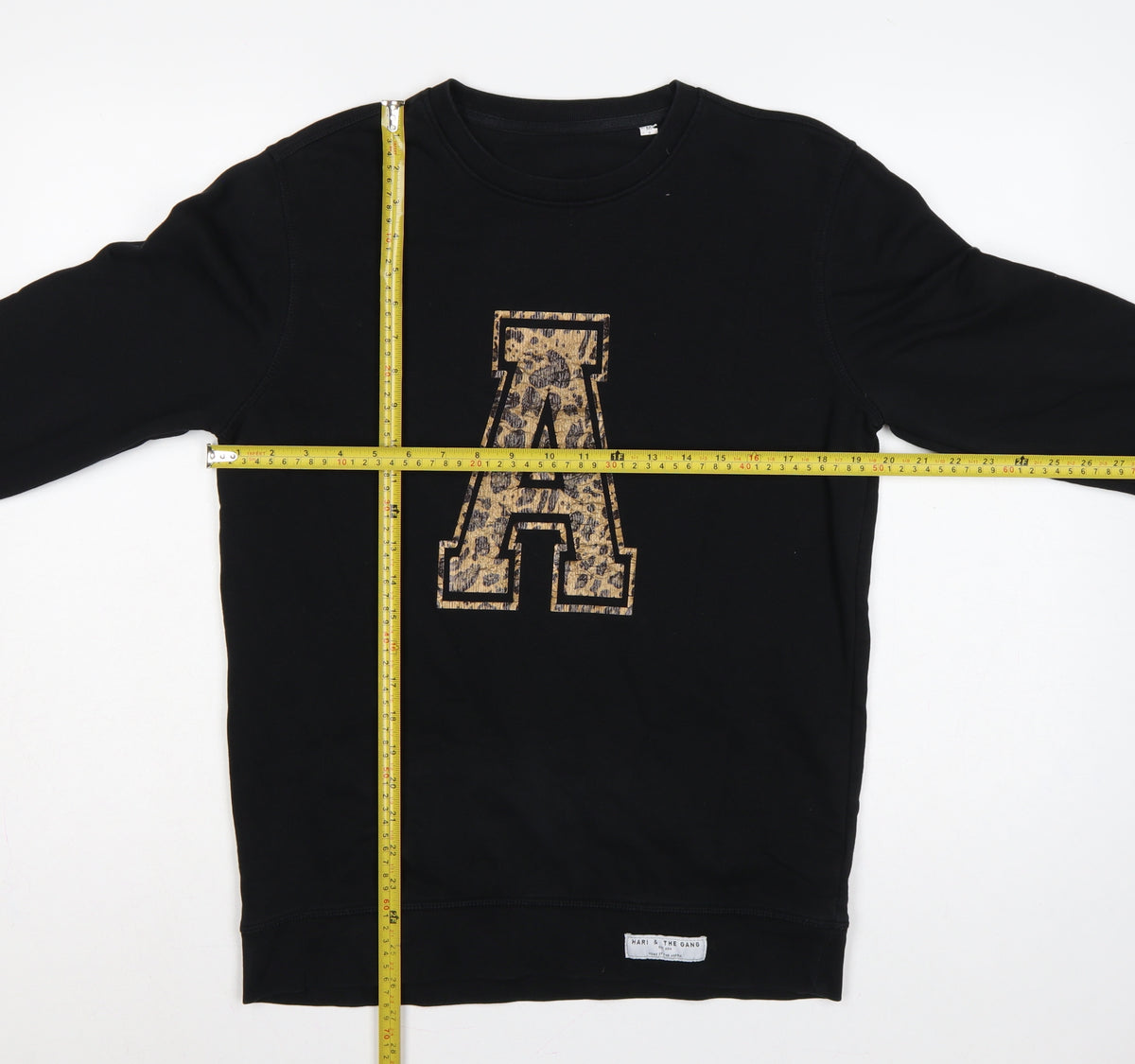 Close-up detail of Hari & The Gang Women's Black M Pullover Sweatshirt Leopard A Logo