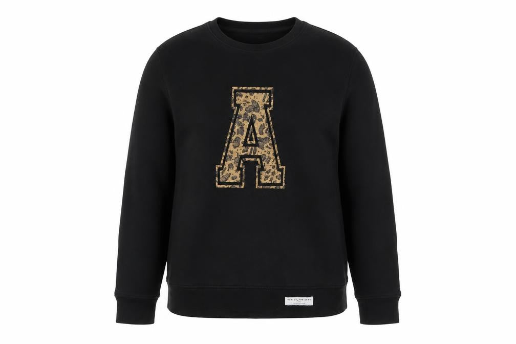 Front view of Hari & The Gang Women's Black M Pullover Sweatshirt Leopard A Logo