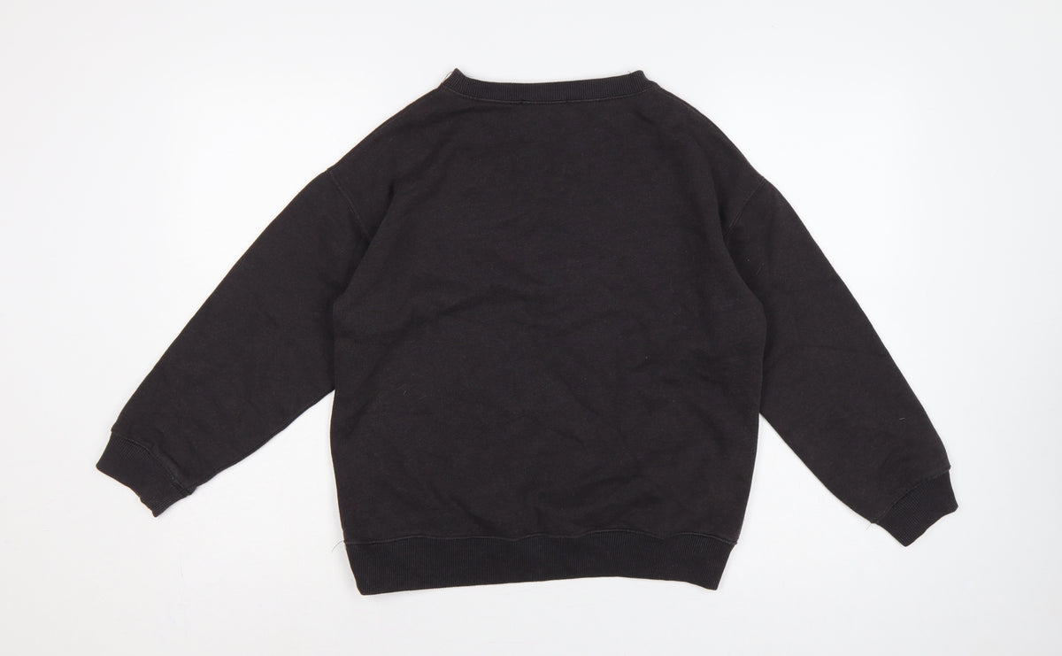 Brand and care label for AC/DC girls’ black pearl logo pullover sweatshirt 13-14 years