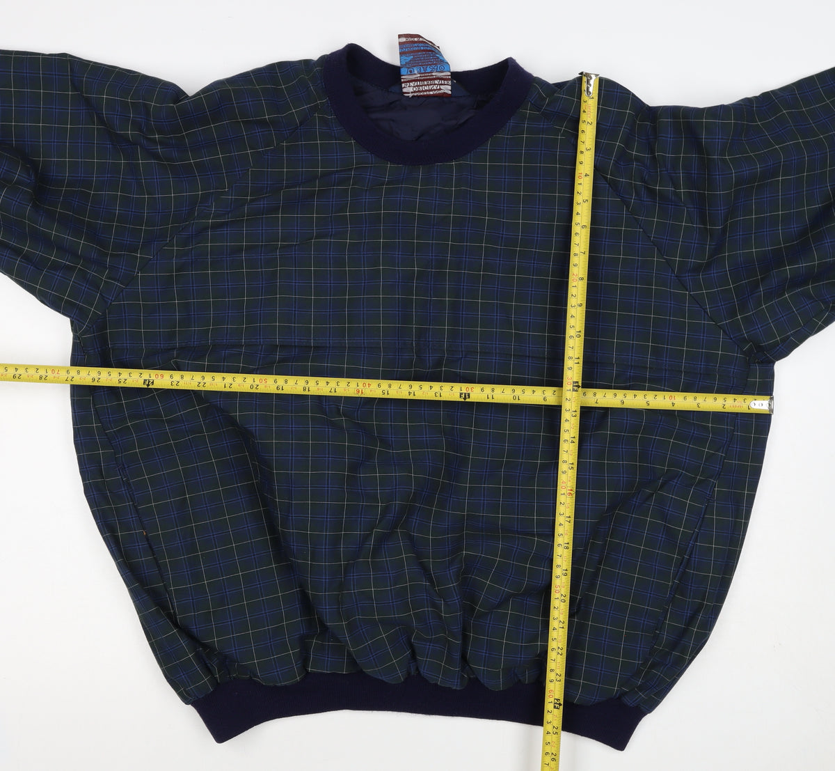 Brand and care label for Sunderland Men’s Blue Plaid Waterproof Pullover Sweatshirt XL Golf