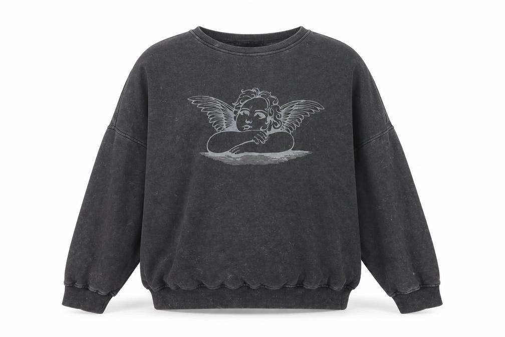 Front view of Motel Women Black S Angel Graphic Oversized Pullover Sweatshirt