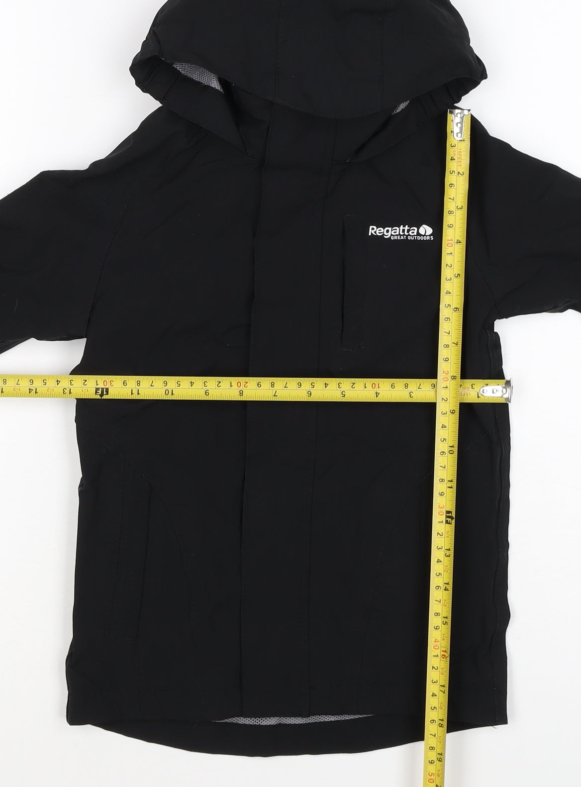 Brand and care label for Regatta boys’ black 3-4 years hooded isotex waterproof softshell jacket