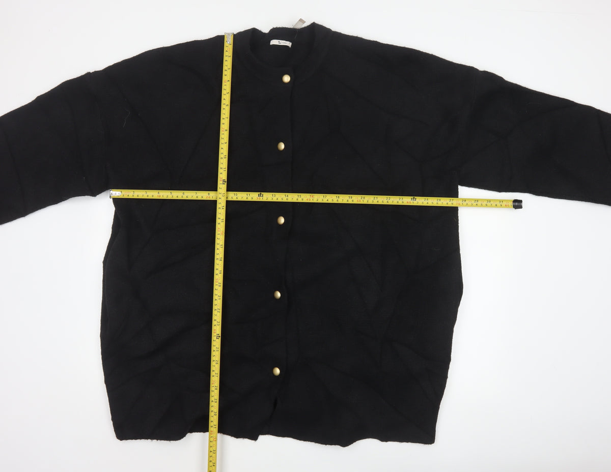 Close-up detail of Tu Women’s Black, size UK 18, Button Front Knit Cardigan Gold Buttons