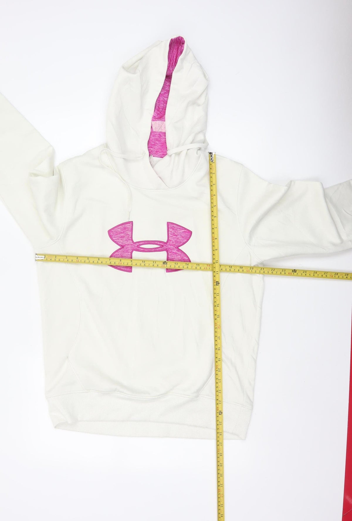 Close-up detail of Under Armour Teens White Pink Logo Pullover Hoodie L