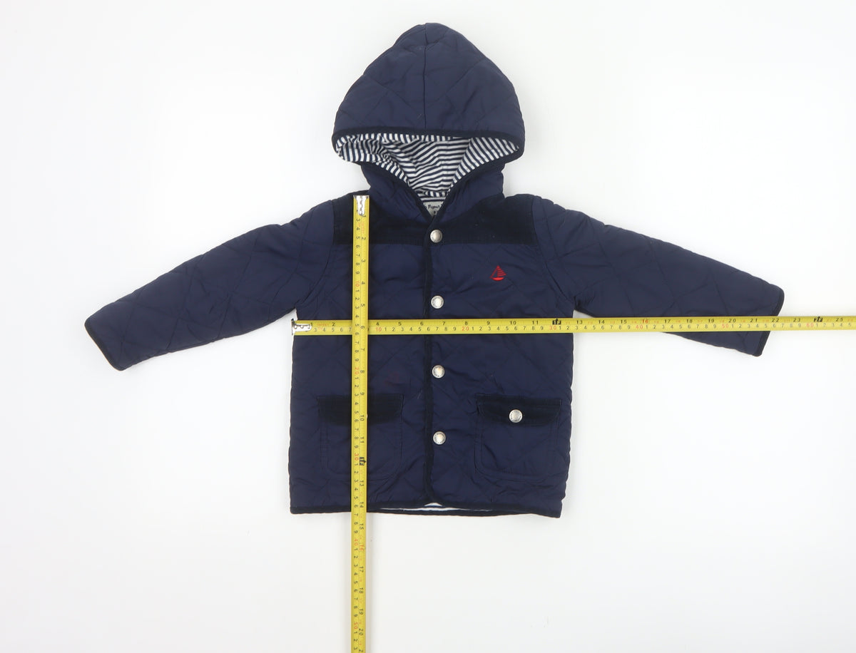 Brand and care label for JoJo Maman Bébé boys’ blue 18-24 months quilted hooded jacket