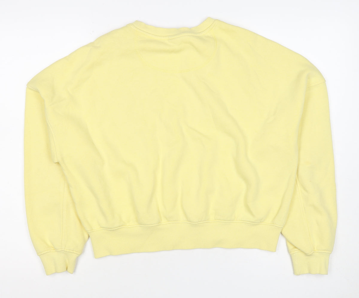 Close-up detail of H&M Women Yellow S Pullover Sweatshirt Embroidered Logo Crew Neck