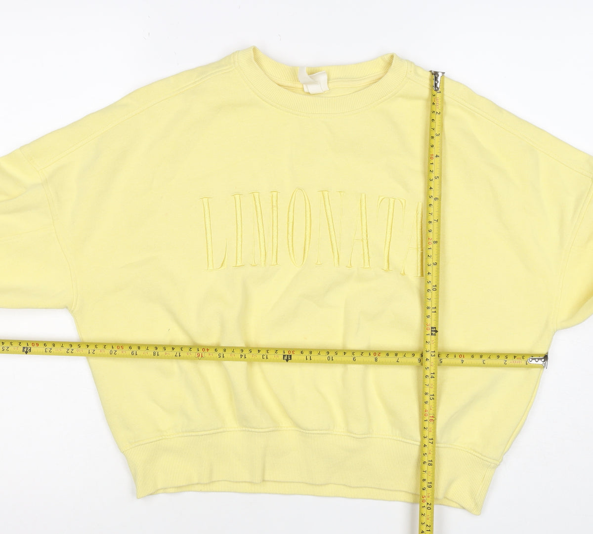 Brand and care label for H&M Women Yellow S Pullover Sweatshirt Embroidered Logo Crew Neck