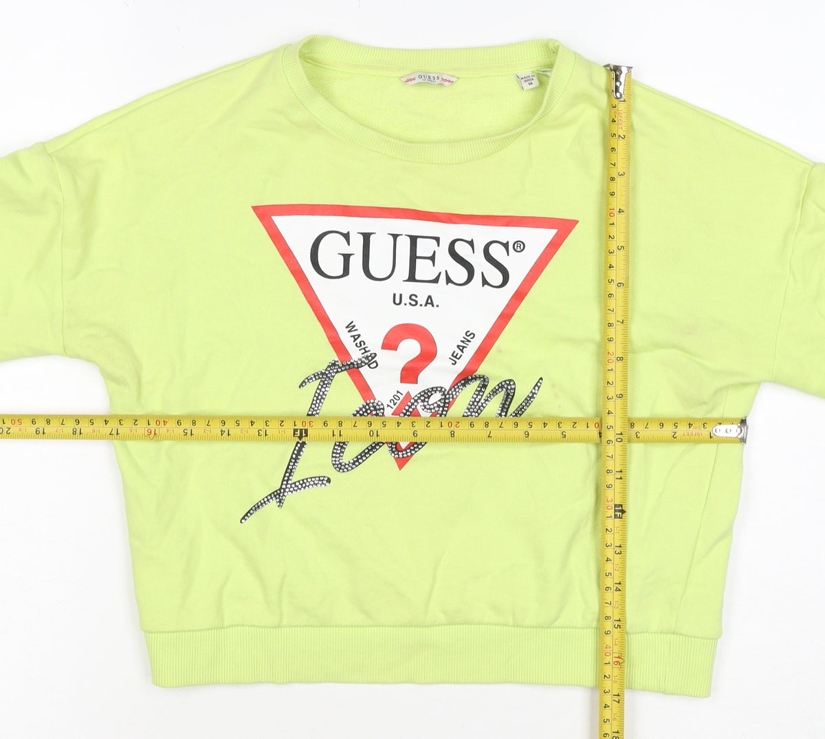 Brand and care label for Guess Teens Yellow Logo Rhinestone Pullover Sweatshirt, size 14