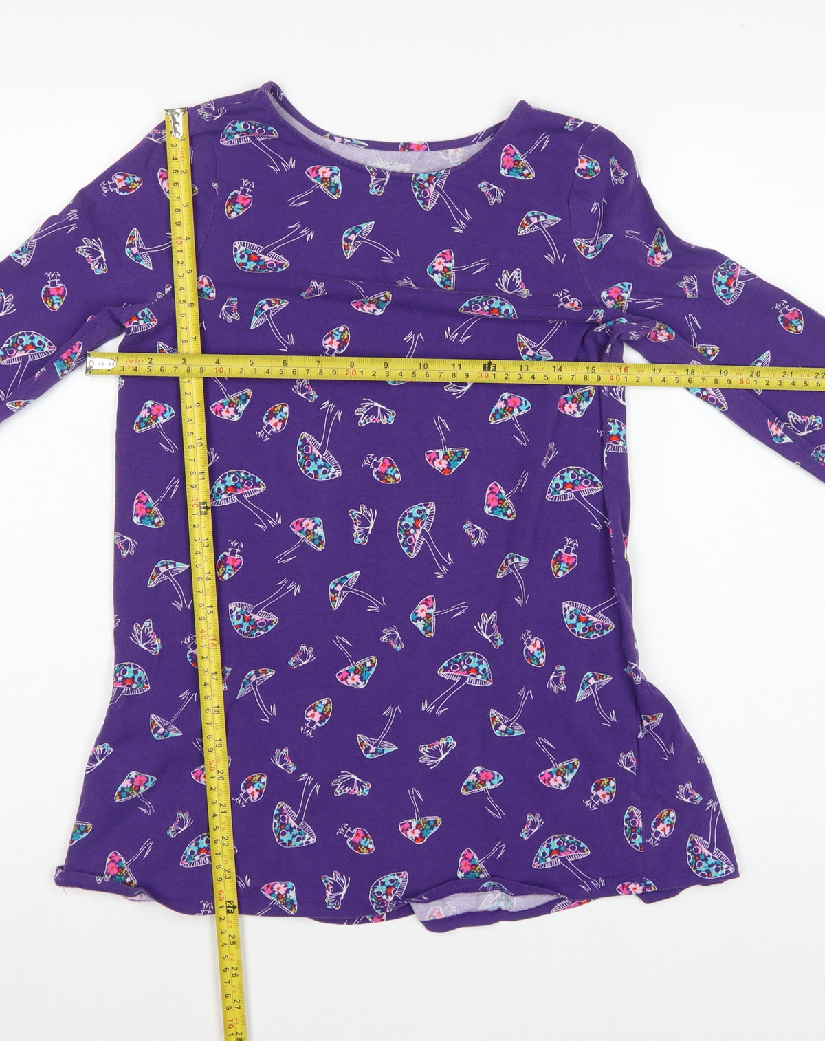 Close-up detail of Lands' End Teens Purple Mushroom Print Long Sleeve Ruffle Tunic, size 10