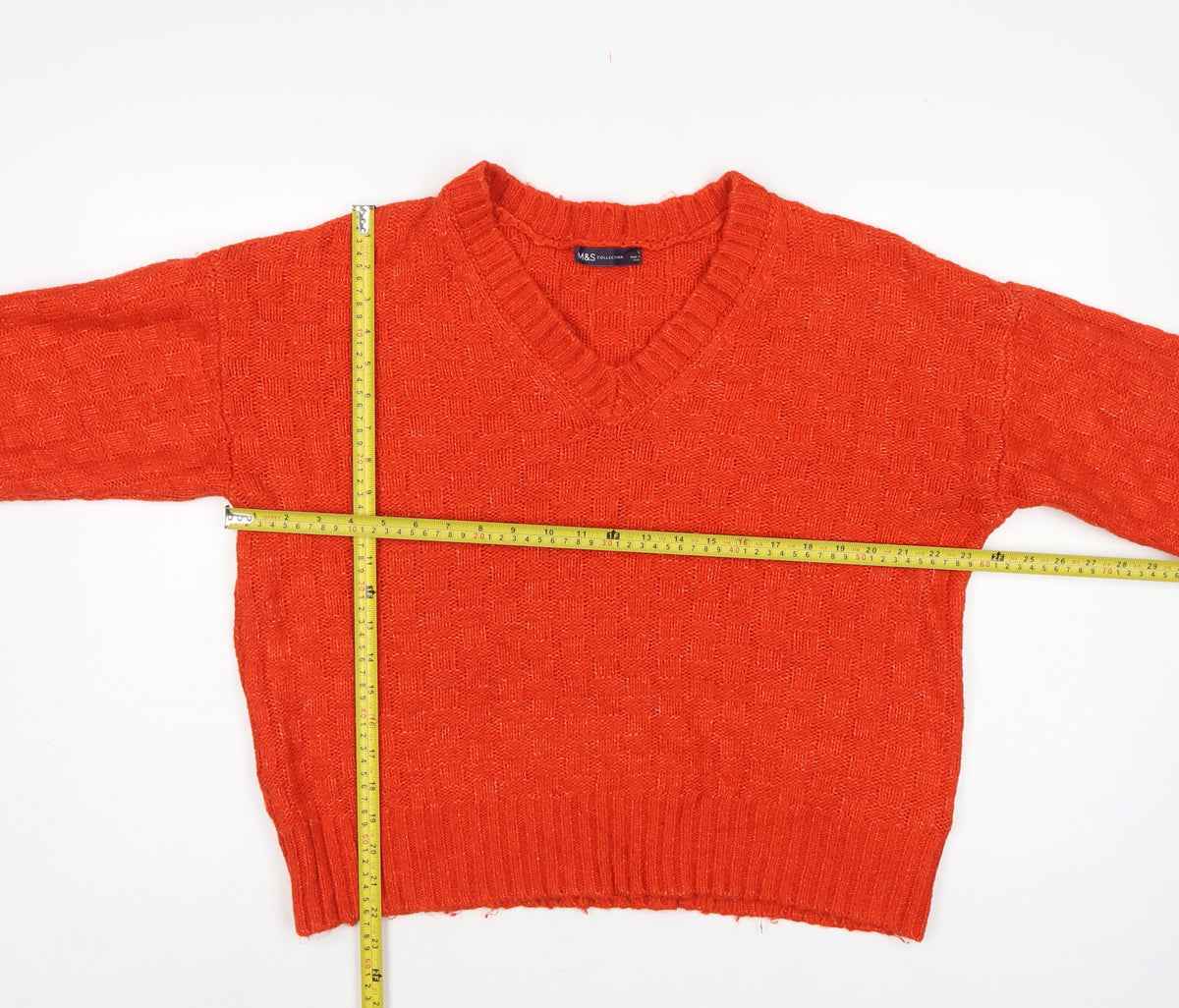 Close-up detail of Marks & Spencer Women's Orange Large V-Neck Geometric Knit Jumper