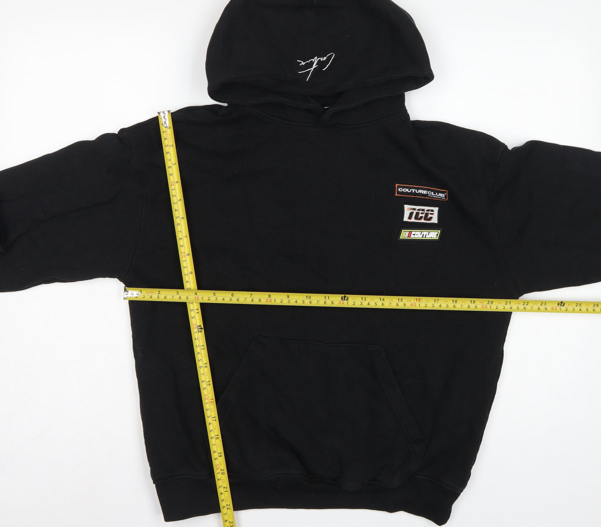 Close-up detail of Couture Women’s Black XS Pullover Hoodie Embroidered Logo Pockets