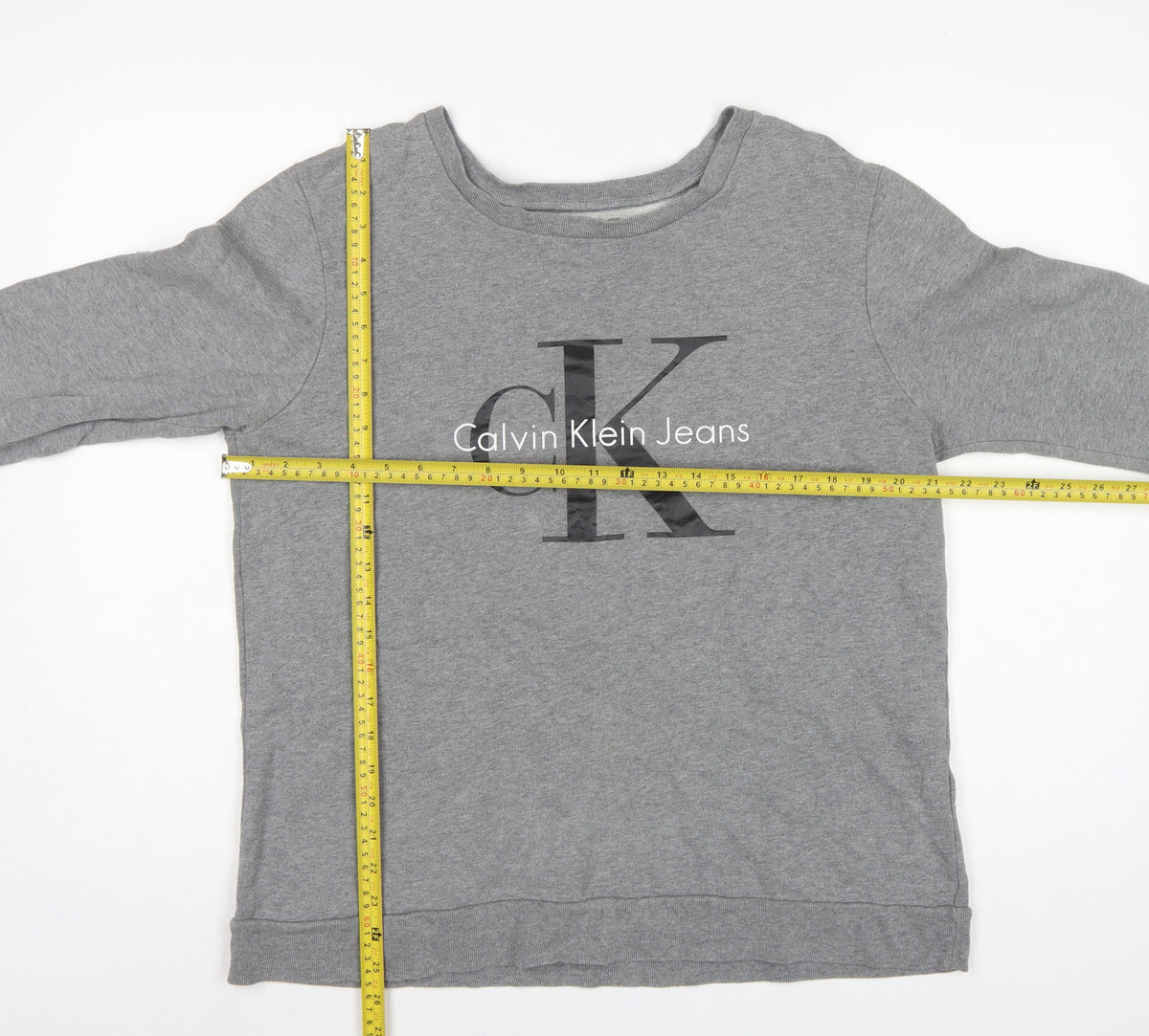 Close-up detail of Calvin Klein Jeans Women’s Grey L Logo Pullover Sweatshirt
