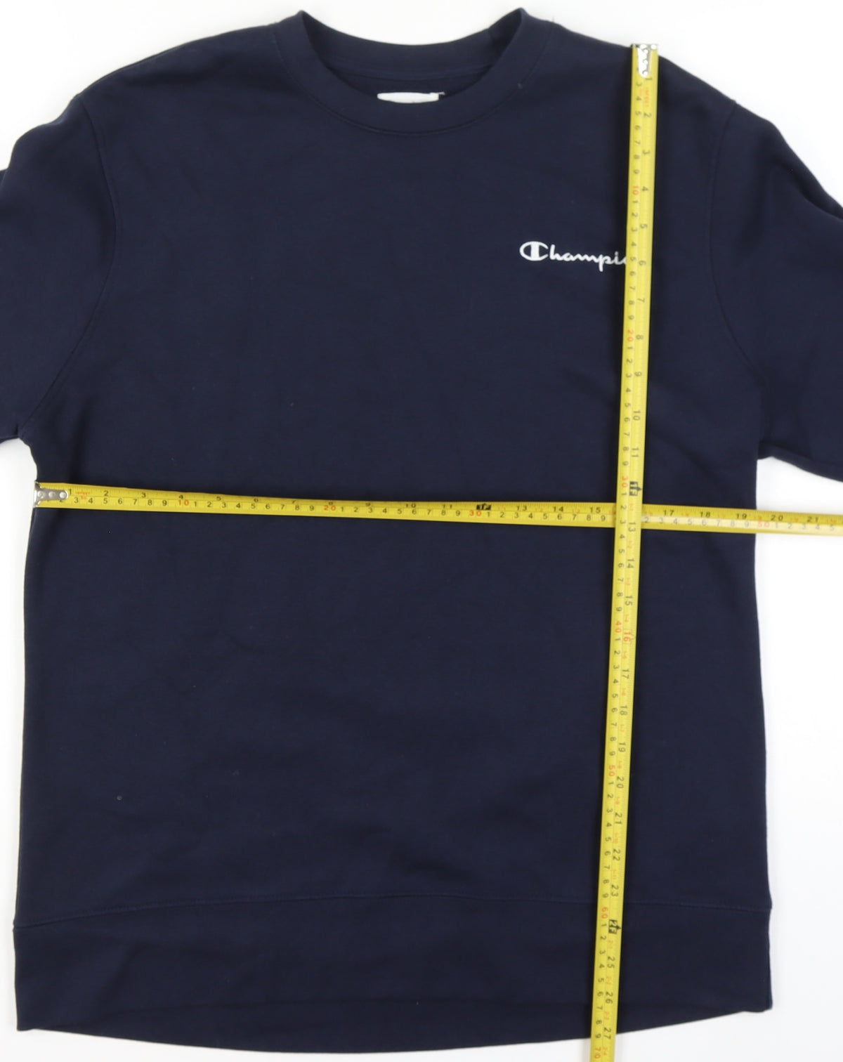 Close-up detail of Champion Men’s Blue M Crew Neck Logo Pullover Sweatshirt