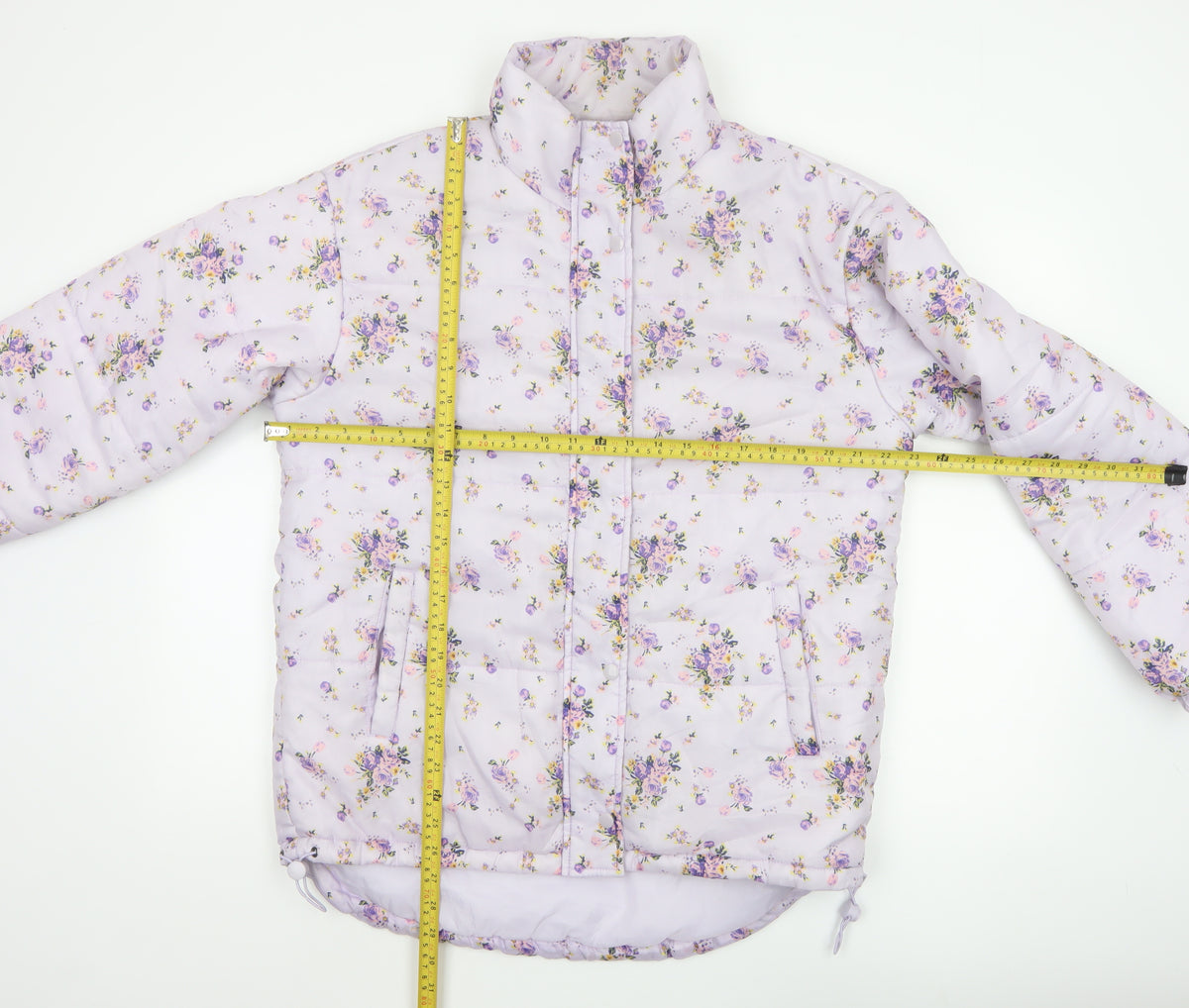 Close-up detail of SIR Women’s Purple Floral Puffer Jacket, size S, Quilted