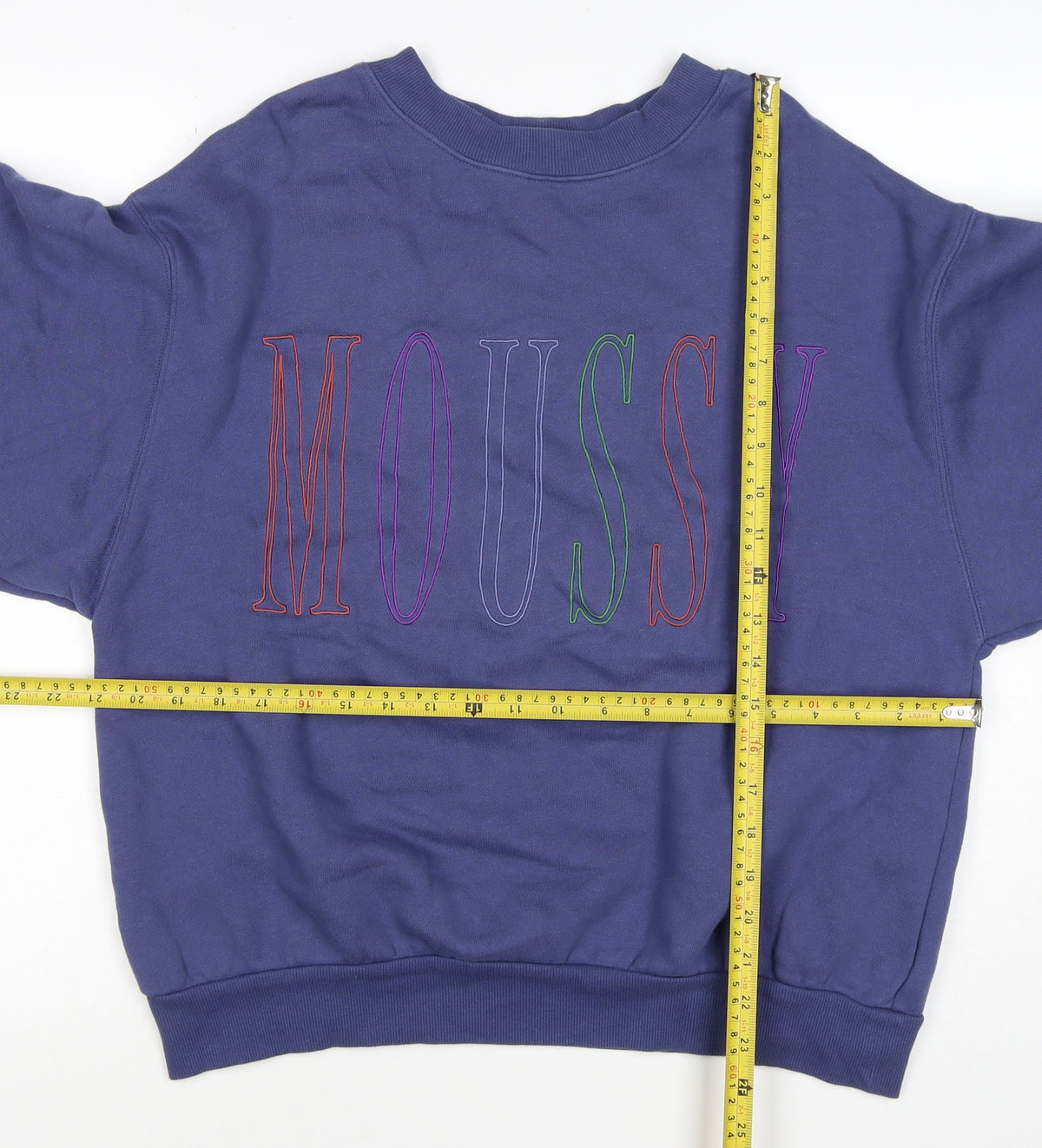 Brand and care label for Mousy Women’s Blue One Size Pullover Sweatshirt Embroidered Logo