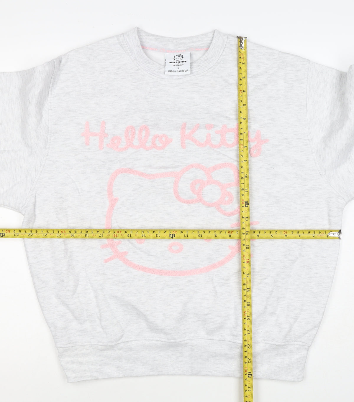 Brand and care label for Primark Hello Kitty Women’s Grey Pink S Pullover Sweatshirt
