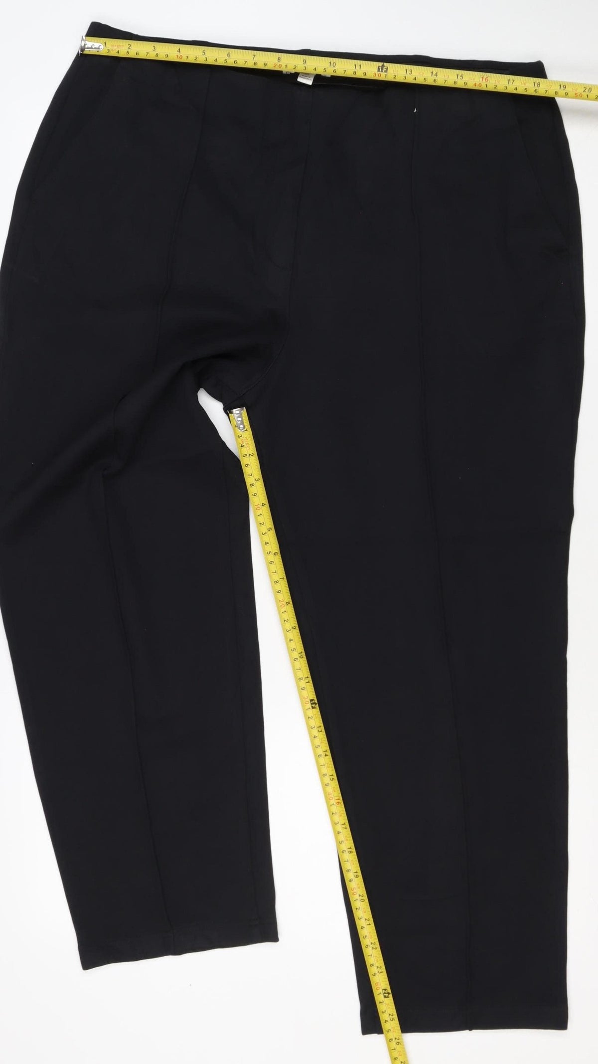 Brand and care label for Marks and Spencer Women Black, size 20, Short Straight Stretch Trousers