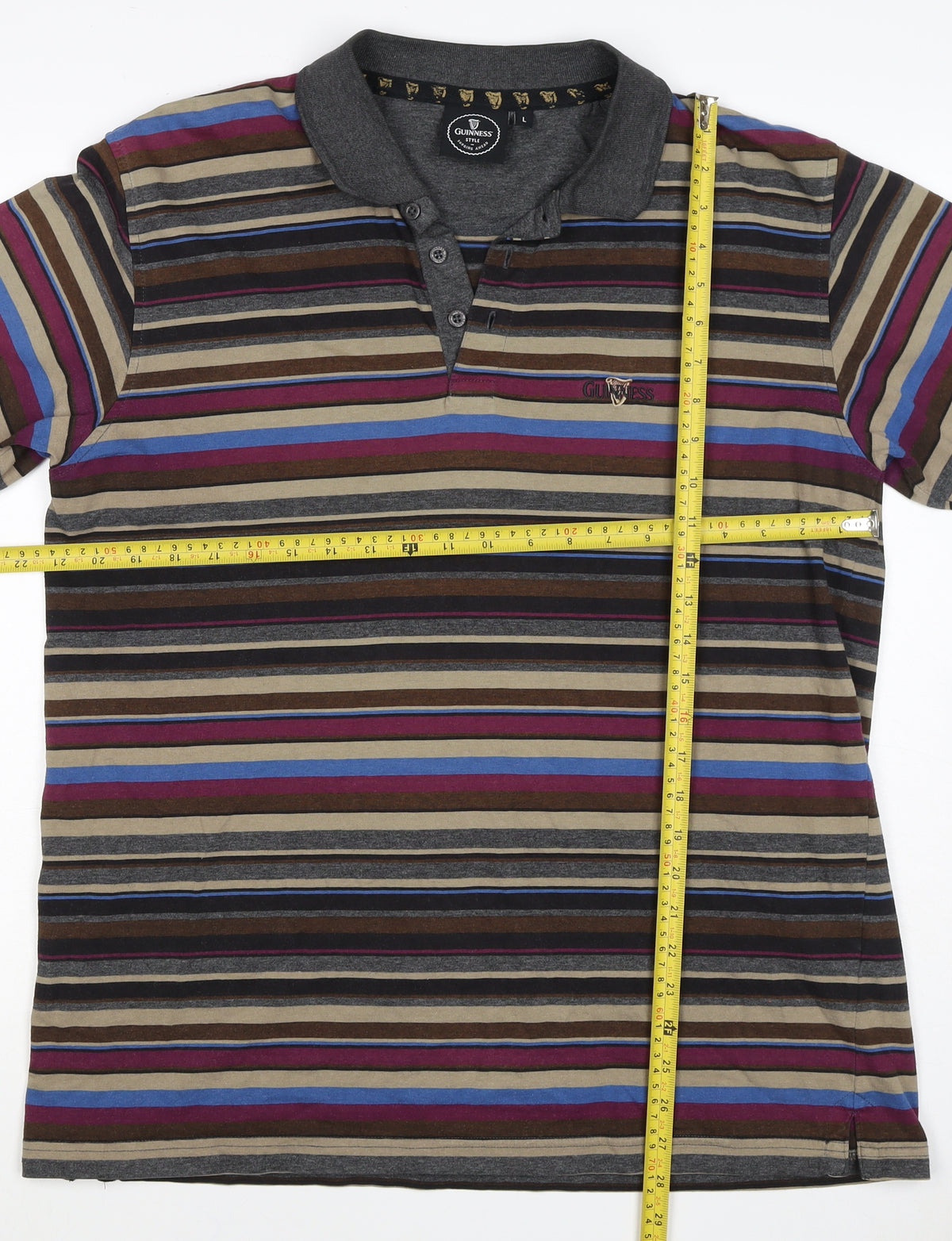 Brand and care label for Guinness Men’s Multicoloured Striped Logo Short Sleeve Polo L
