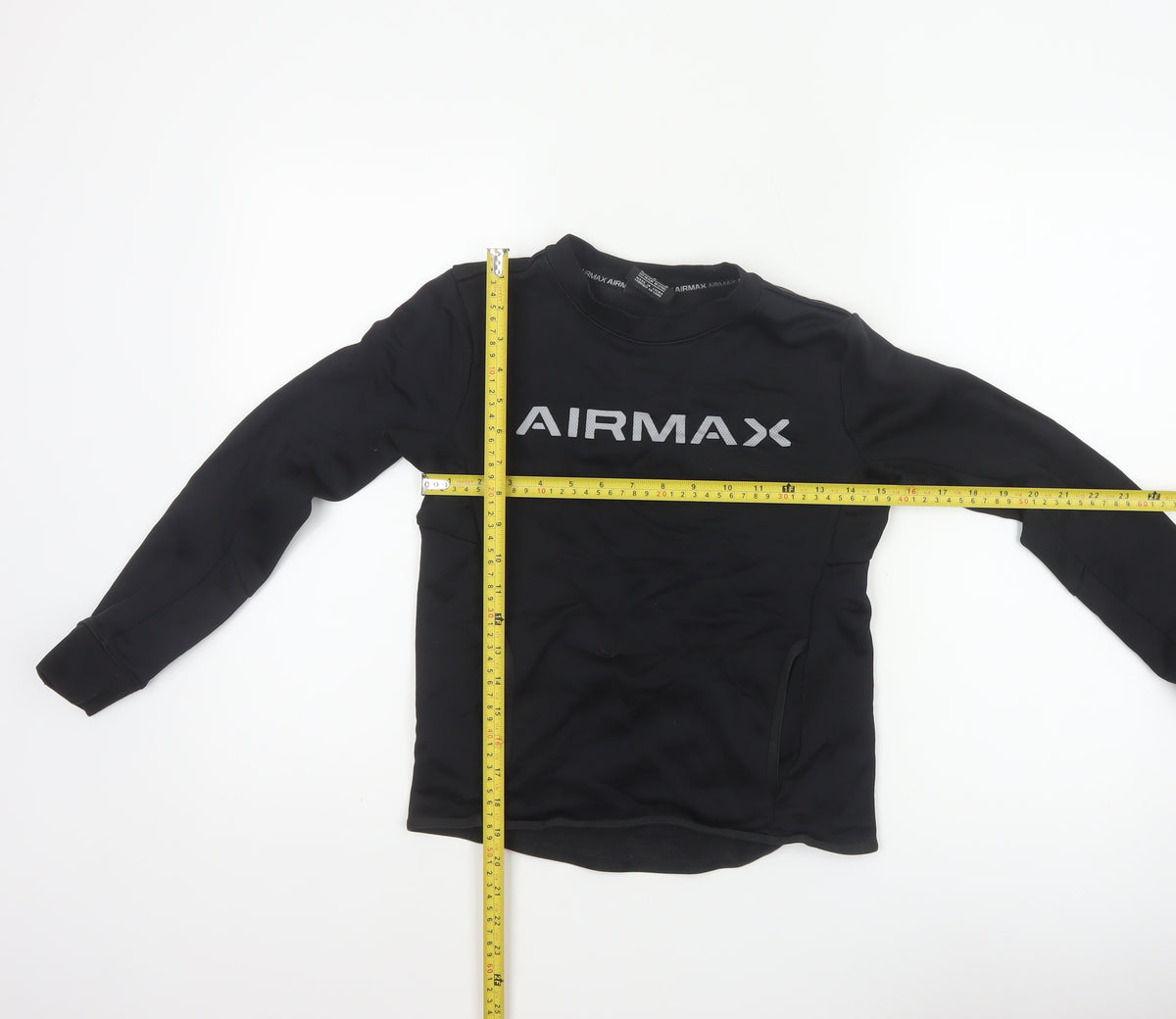 Close-up detail of Nike boys’ black 11-12 years air max logo crew neck pullover sweatshirt