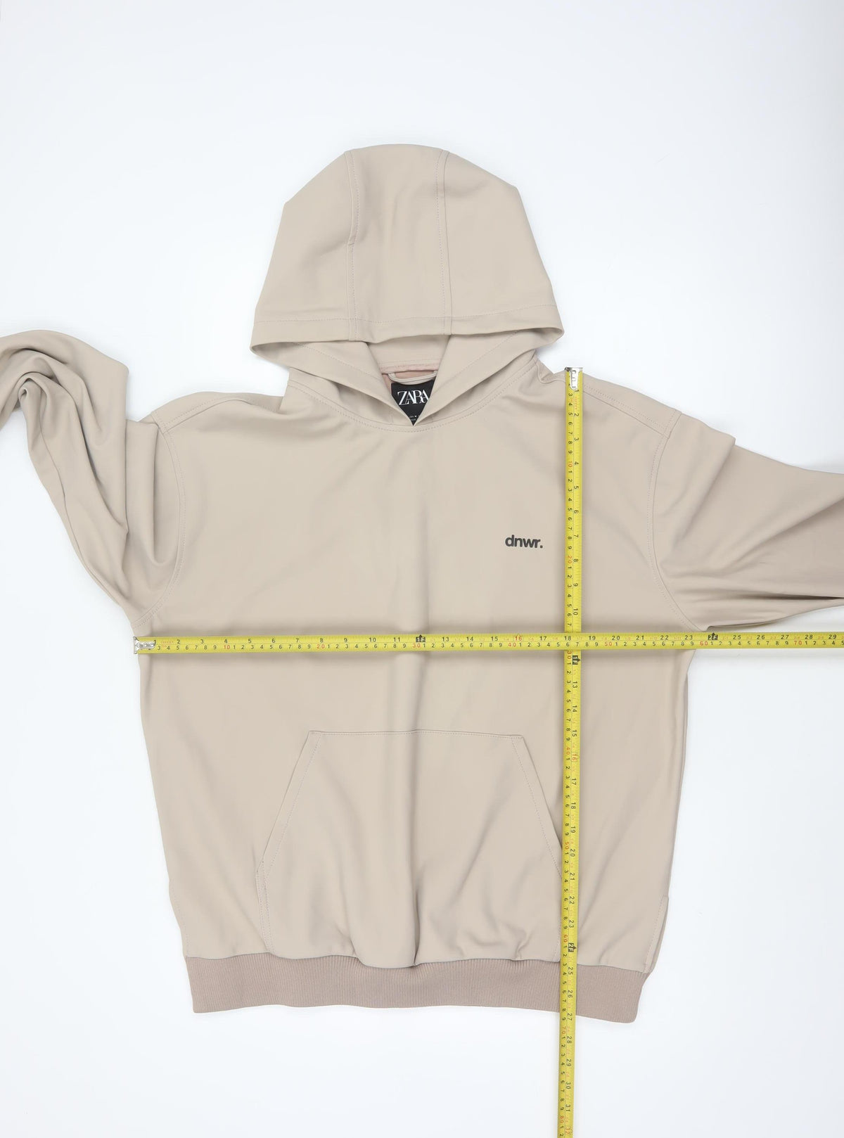 Close-up detail of Zara Men Beige M dnwr. Logo Pullover Hooded Sweatshirt