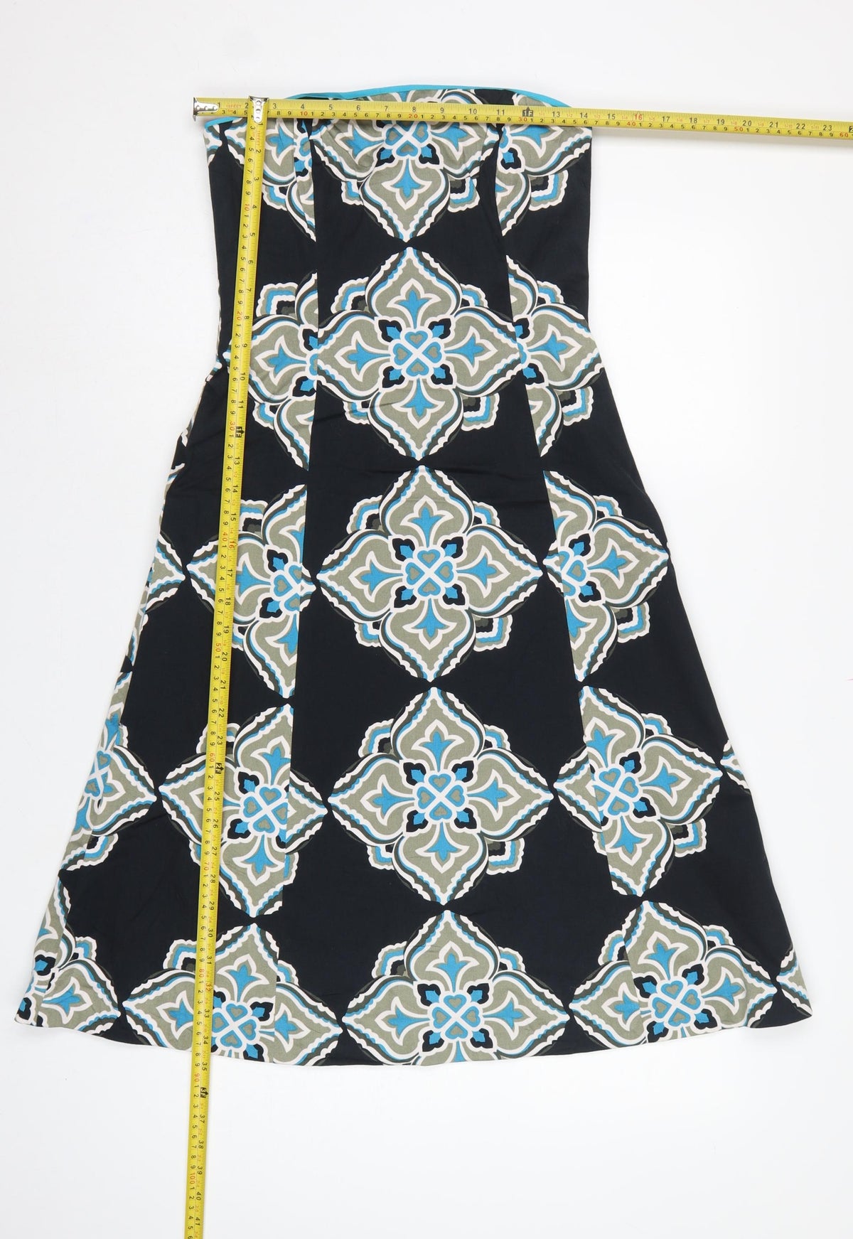 Close-up detail of Coast Women Black Geometric Strapless A-Line Dress, size 8