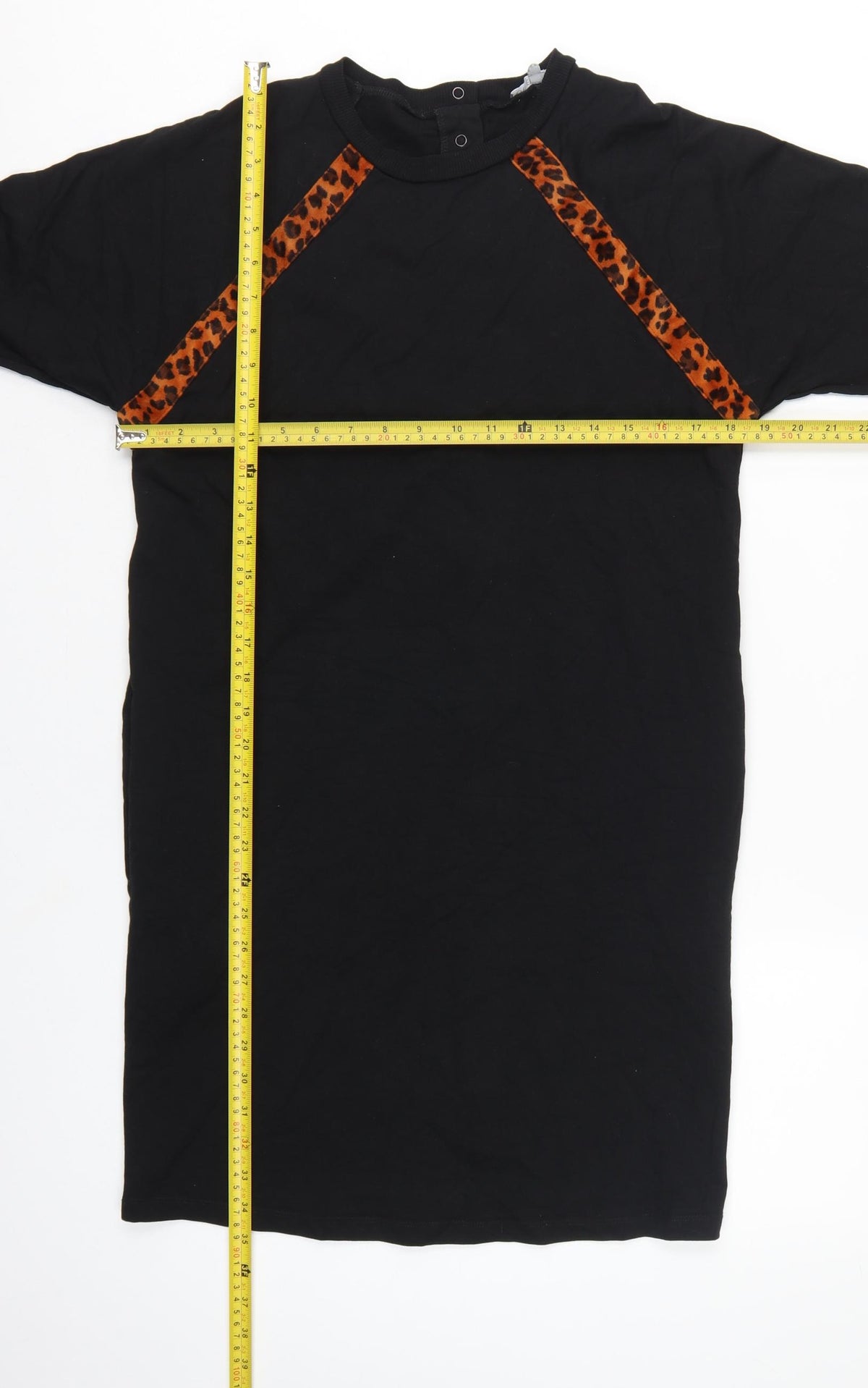 Close-up detail of Oliver Bonas Women Black Leopard Panel Jumper Dress, size S