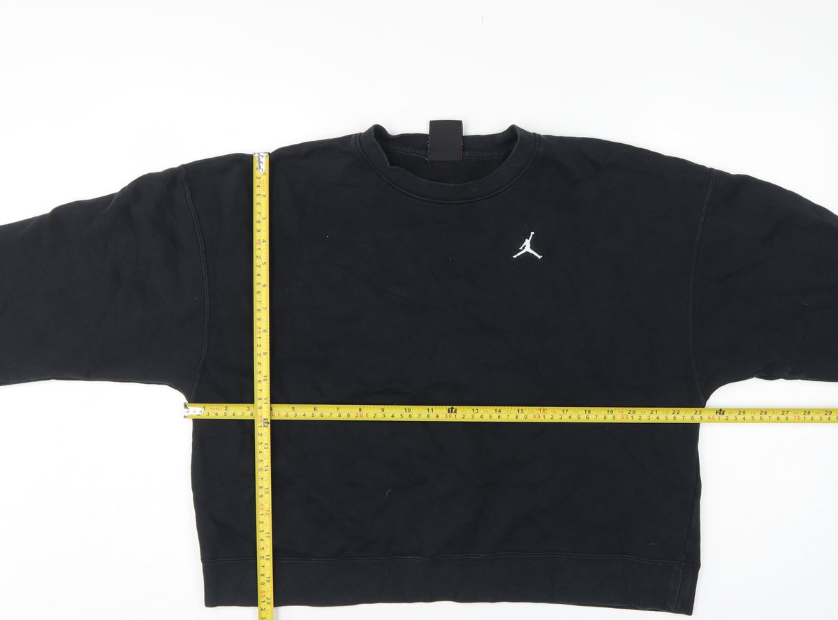Close-up detail of Jordan Women’s Black S Loose Fit Logo Crewneck Pullover Sweatshirt