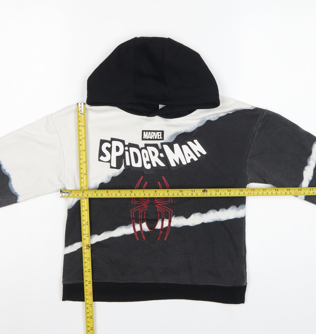 Close-up detail of Marvel boys’ black white spider-man hoodie 5-6 years graphic pullover