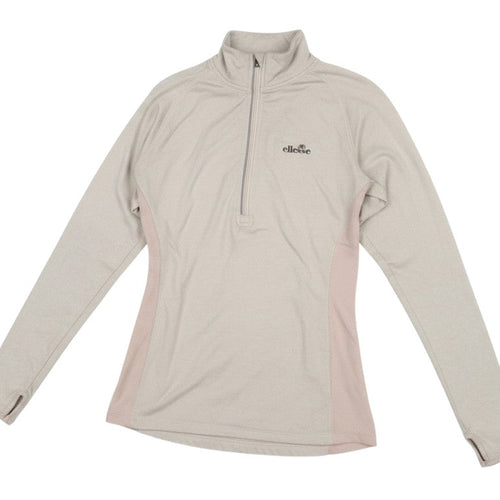 Prewornwholesale Ellesse beige long sleeve quarter-zip activewear top with blush side panels and thumbhole cuffs.