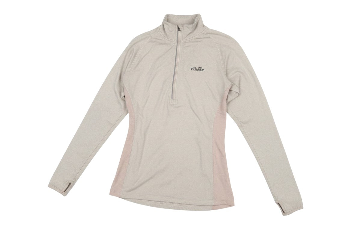 Prewornwholesale Ellesse beige long sleeve quarter-zip activewear top with blush side panels and thumbhole cuffs.