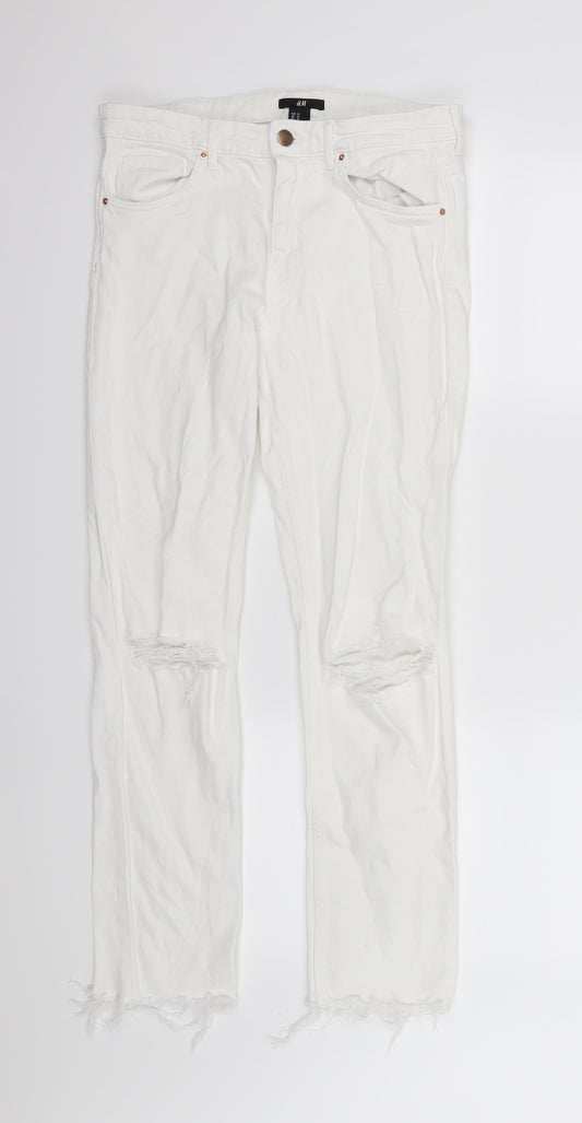 Front view of H&M men’s white denim skinny jeans, size 29, 28-inch leg