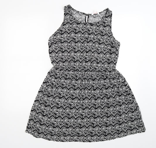 Front view of Papaya women’s black floral knit fit & flare, size UK 12