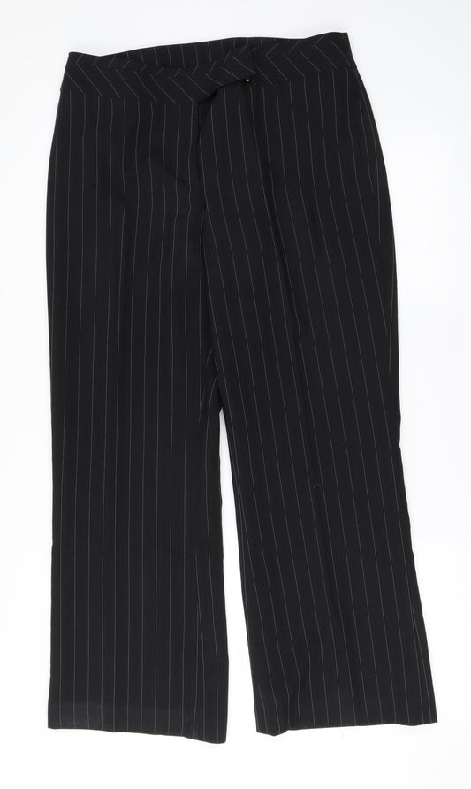 Front view of F&F women’s black trousers, size UK 32, in, 29-inch leg