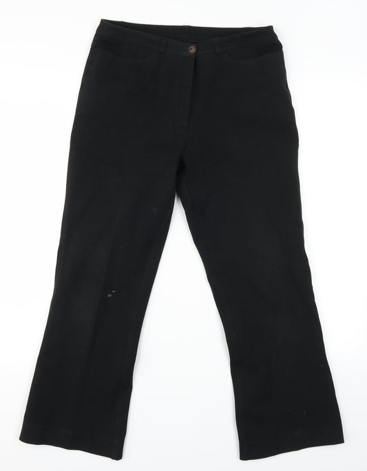 Front view of women’s black cropped jeans, size UK 28, in, 24-inch leg