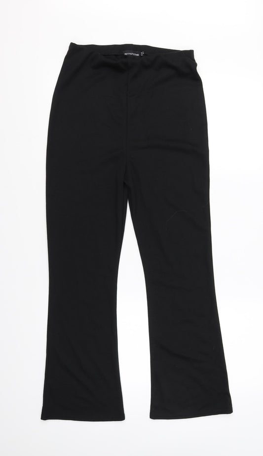 Front view of PRETTYLITTLETHING women’s black jegging leggings, size UK 10, 31-inch leg
