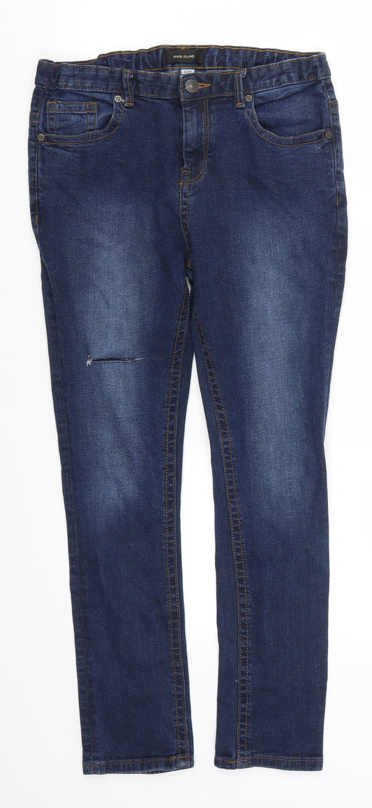 Front view of River Island girls’ blue denim skinny jeans, size 12, years - distressed look
