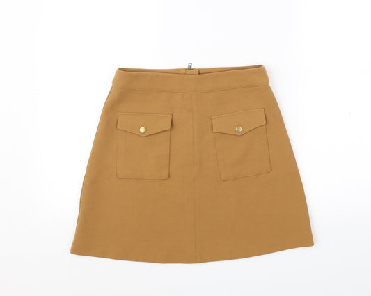 Front view of Divided women’s orange flare skirt, size UK 10