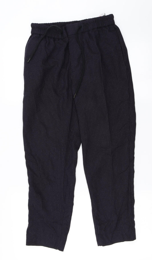 Front view of Topman women’s blue trousers, size UK 24, in, 22-inch leg