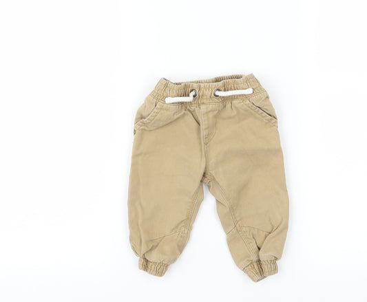 Front view of F&F boys’ brown cargo trousers, size 6-9, months