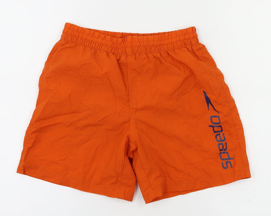 Front view of Speedo boys’ orange sweat shorts, size M