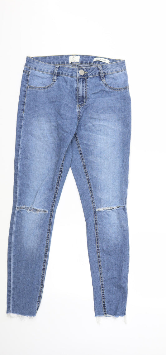 Front view of 91 Cotton girls’ blue denim skinny jeans, size 12, years