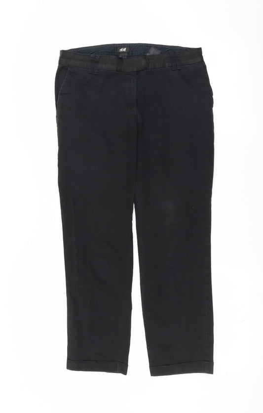 Front view of H&M men’s black trousers, size 30, in, 24-inch leg