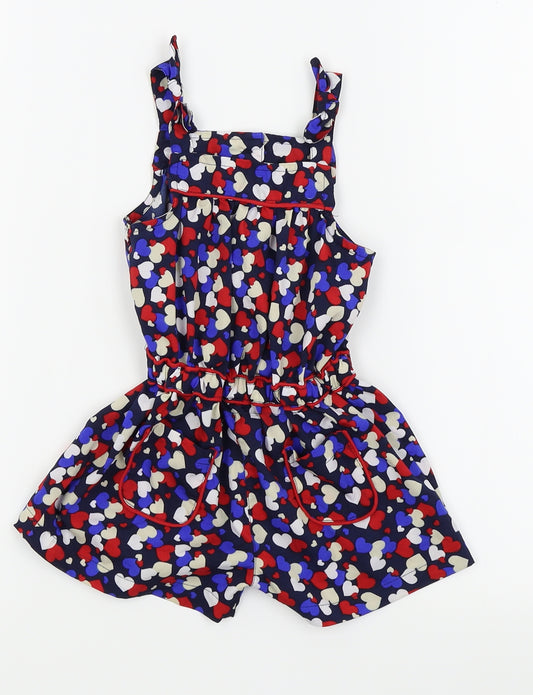 Front view of Matalan girls’ blue dungaree one-piece, size 12-18, months - heart detail/playsuit