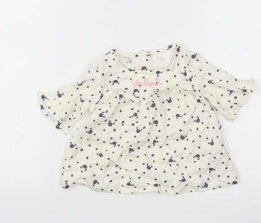 Front view of Primark girls’ white animal print basic t-shirt, size 6-9, months
