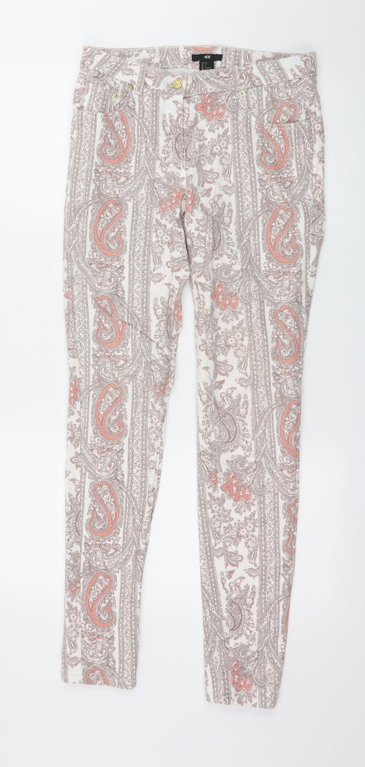 Front view of H&M women’s multicoloured paisley denim skinny jeans, size UK 10, 30-inch leg