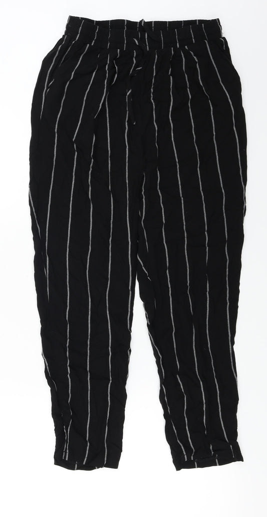 Front view of PRETTYLITTLETHING women’s black striped trousers, size UK 8, 21-inch leg