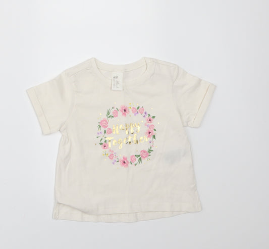 Front view of H&M girls’ ivory basic t-shirt, size 3-6, months - happy together