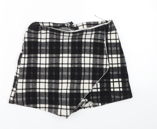 Front view of New Look girls’ black check cut-off shorts, size 9, years
